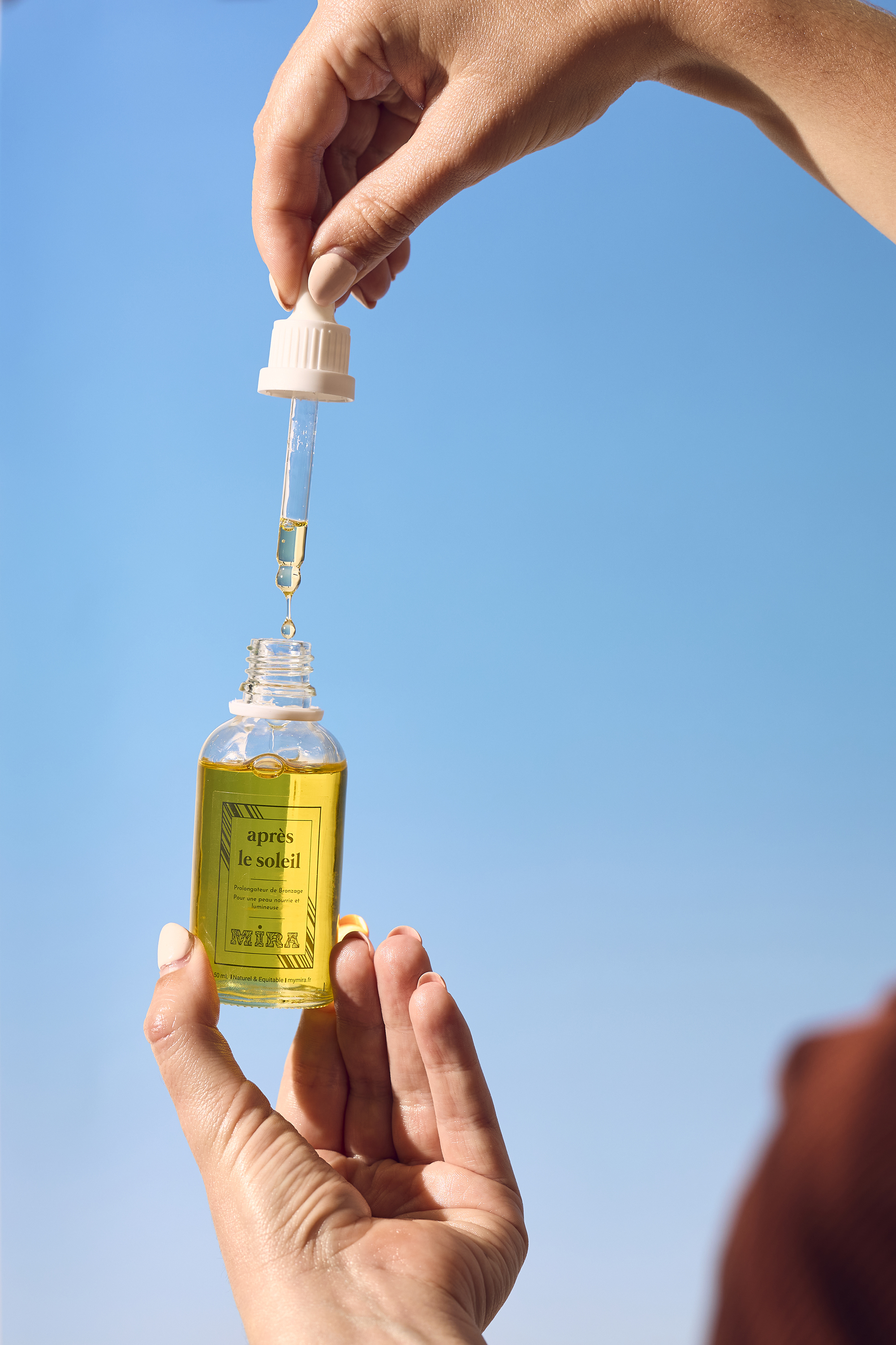 L’huile après-soleil prolongatrice de bronzage